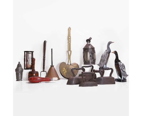 A collection of kitchenwares, including: a brass chestnut warmer, 59cm long,five flat irons,a timer in a turned beechwood sta