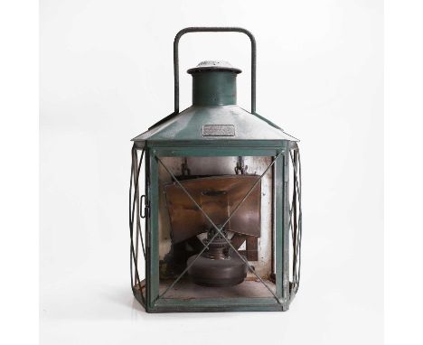 A painted tinplate paraffin lantern, 20th century, French, by J Guichard &amp; C Couvard,33cm wide25cm deep55cm highCondition