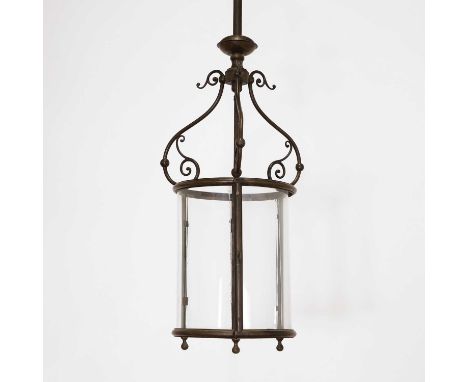 A brass hall lantern, 20th century, French, with scrolled supports and fitted with three lights and a suspension chain,37cm d