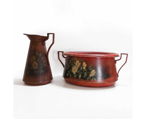 A toleware jug and basin, 20th century, each with floral decoration on a red ground,basin 57cm wide 25cm high (2)Condition Re