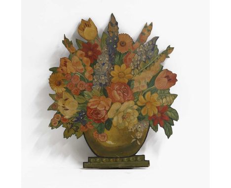 A painted wooden fire screen, of recent manufacture, in the form of a vase of flowers,64cm wide77cm highCondition ReportGood