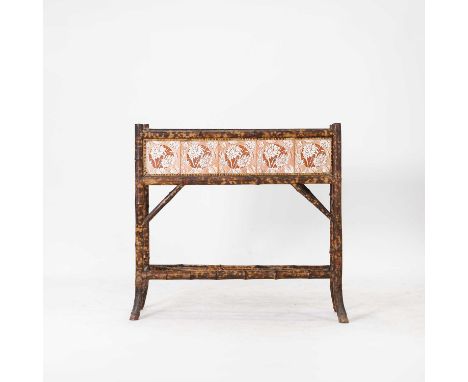 A Victorian bamboo plant stand, the body decorated with stylised floral tiles,84cm wide28cm deep80cm highCondition Reportmino