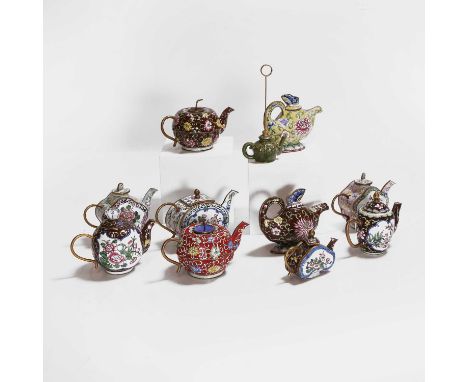 Ten miniature teapots and covers, 20th century, Chinese, each with enamelled decoration, 12.5cm high,together with an enamell