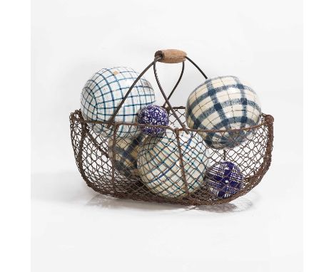 A basket of eight various carpet bowls, including four ceramic and four papier mâché examples,largest 16cm diameter (9)Condit