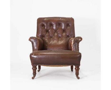 A Victorian leather armchair,  with a buttoned back and turned front legs, 78cm wide 92cm deep 90cm high   Condition Reportle