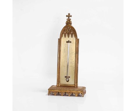 A Victorian Gothic-framed gilt-brass thermometer, raised on a carved and pierced rectangular base, 12.5cm wide28.5cm highCond