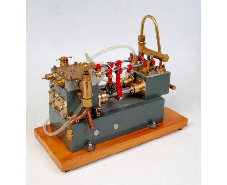 Designed and built by Norman Gregory and entered in 1979 2nd Midland Model Engineering Exhibition, a twin horizontal steam/co