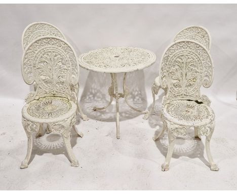 White painted cast aluminium circular garden table and four chairs with pierced decoration and a matching bench (6)