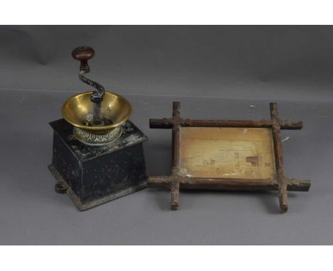 A late Victorian brass and iron coffee grinder by Kenrick  & Sons, together with a Daguerreotype photograph of a Gardner's Ca