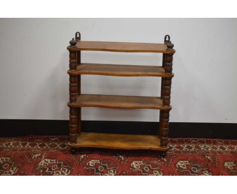 A Victorian set of mahogany hanging wall shelves, four shelves with bobbin turned pillars to front. 53 cm high by 45 cm wide 