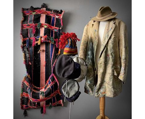 Sven's painting coat and five of his hats together with his traditional 'Lapp' or Sami hat which can be seen in some of his s