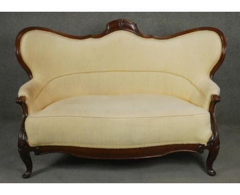 A 19th century mahogany sofa in carved and shaped frame on cabriole supports. H.100 W.156 D.70cm 