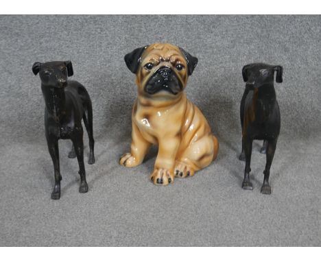 A pair of vintage cast iron greyhound statues along with a ceramic painted bulldog. 