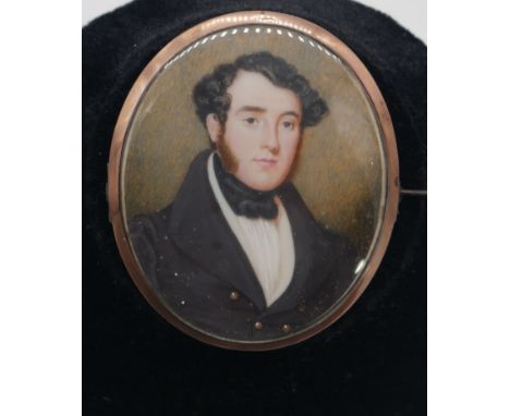 A 19th century double sided portrait miniature mourning brooch with yellow metal case, miniature on ivory of a young gentlema