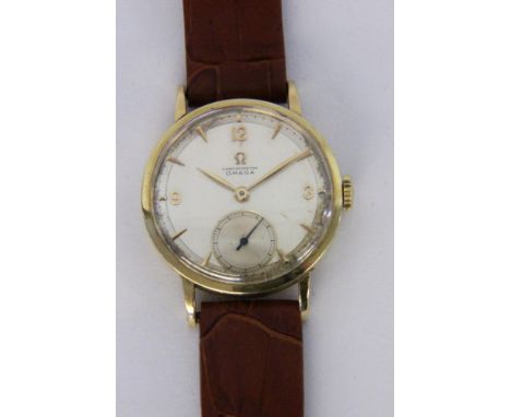   OMEGA HERRENARMBANDUHR.  1940er/50er Jahre Gehäuse 750/000 Gelbgold. Chronometer mit Handaufzug. Lederband. D.32mm. Intakt 