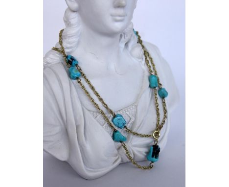   HALSKETTE MIT TÜRKISEN  333/000 Gelbgold. L.62,5cm        A NECKLACE WITH TURQUOISES 333/000 yellow gold. 62.5 cm long. Key
