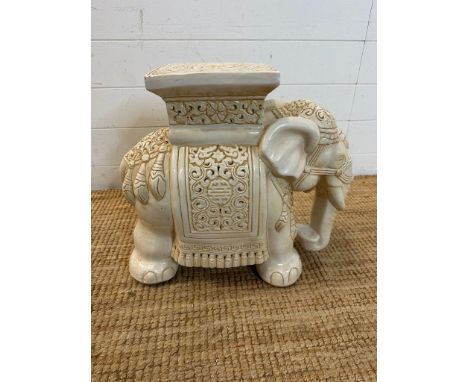 A ceramic white elephant style pierced plant stand 