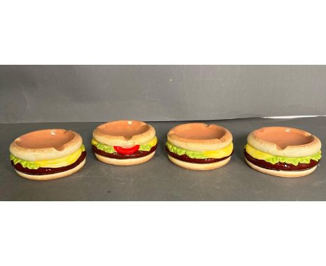 Four ceramic burger ash trays 