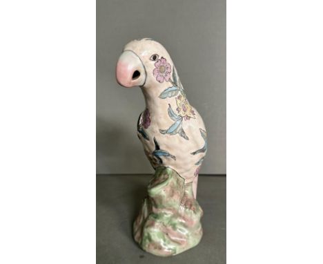 A W.B.I florally painted ceramic parrot 