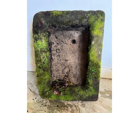 A Primitive water basin now a planter possibly sandstone pump trough 45cm x 68cm 