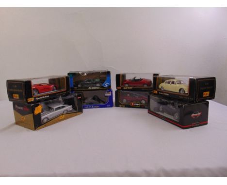 Eight 1/18 scale diecast model card to include Burago