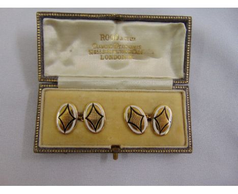 A pair of gold and enamel cufflinks tested 18ct, approx total weight 8.2 g