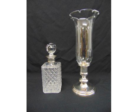 A silver mounted cut glass decanter and Christophle silver plated storm lantern