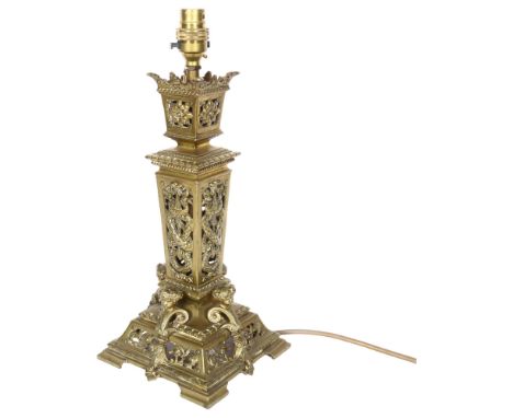 Vintage pierced cast-brass table lamp, with serpent and cherub figures, 37cm overall 