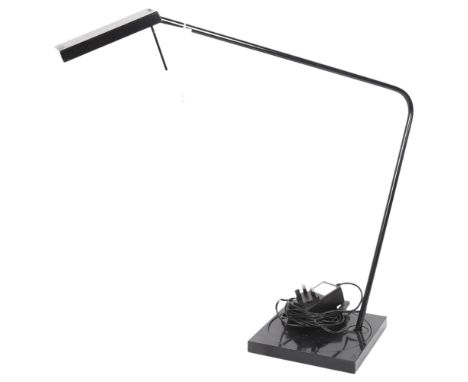 Luxo Ninety - A contemporary designed desk lamp with maker's mark and LED bulb. 