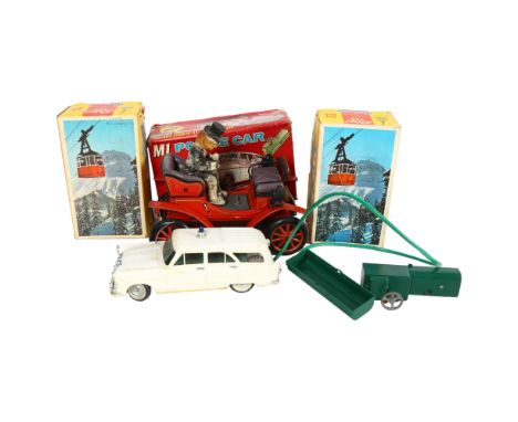 A Vintage Japanese tinplate battery-operated Shakin' Antique car, with driver, unboxed, and 2 similar boxed Lehmann German ti