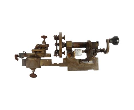A 20th century bronze watchmaker's hand turned lathe, L42cm 