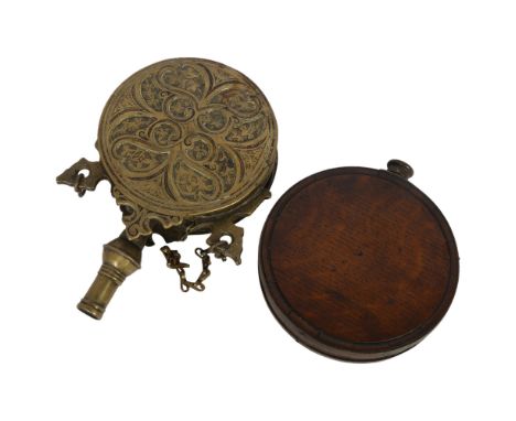 An early 20th century North American brass powder flask, embossed and engraved decoration, L19cm, and a 19th century oak and 