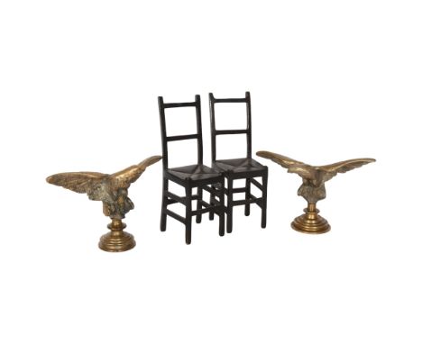 A pair of cast-bronze eagles, wingspan 18cm, and a pair of patinated bronze miniature dining chairs, H19cm 