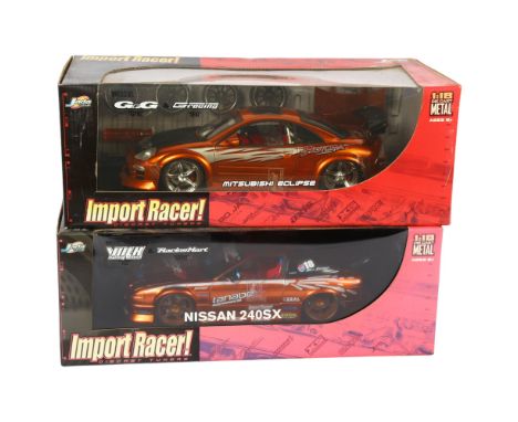 JADA TOYS - Import Racer! diecast tuners, a 1:18 scale diecast model of a Mitsubishi Eclipse, complete in original box on dis