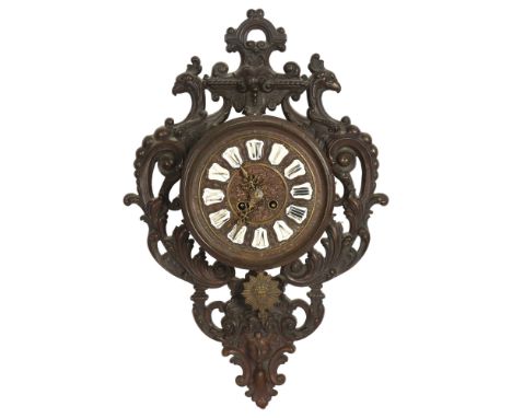 A Black Forest Gothic design wall clock, with a cast-brass griffon mounted surround, 8-day movement, white enamel Roman numer