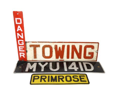 A group of Vintage and modern signs, including an aluminium towing plate, a Vintage aluminium number plate, and an enamel Dan