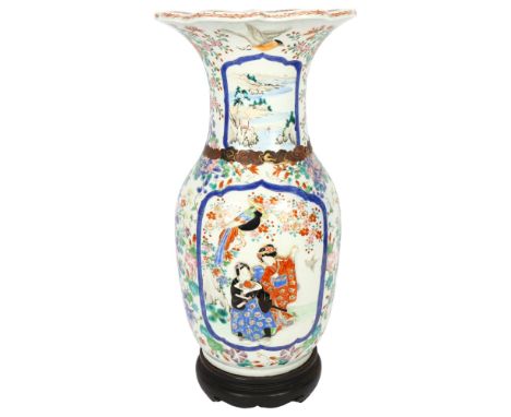 A Chinese enamel decorated vase on turned wood stand, depicting birds and figures 