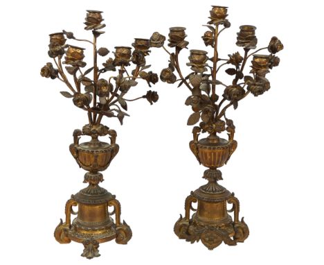 A pair of 19th century gilt-bronze table candelabras, each having 5 floral decorated spray arms on cast feet, H50cmBoth in go