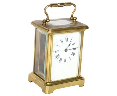 A French brass-cased carriage clock, white enamel dial with Roman numeral hour markers, case height 11cm, not currently worki