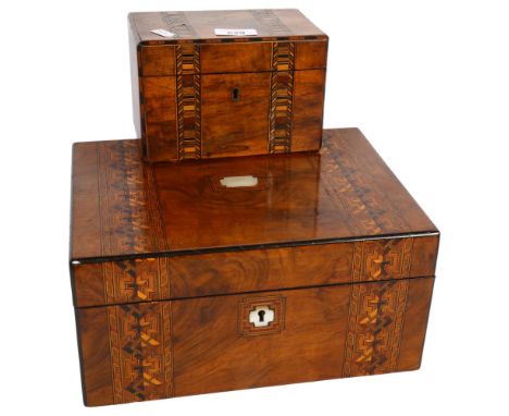A 19th century walnut cross banded writing slope, with mother of pearl inlaid decoration and glass inkwells (30x14x23cm), and
