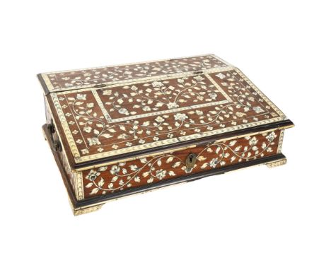 A 19th century Indo-Portuguese writing box, teak and floral ivory inlaid, the rising top revealing&nbsp;a drawer and cubby ho