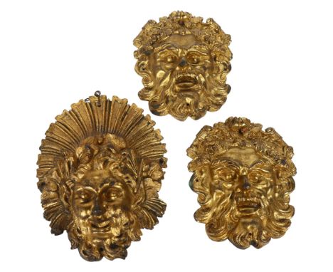 A pair of cast-bronze Green Man plaques, L15cm, and another, L18cm (3) 