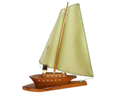 Circa 1950s sailing boat design wooden table lamp with green shades, H54cm 