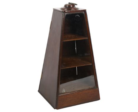 An unusual Antique mahogany display cabinet of triangular form, brass ring carrying handle, glazed front with 3 fitted shelve