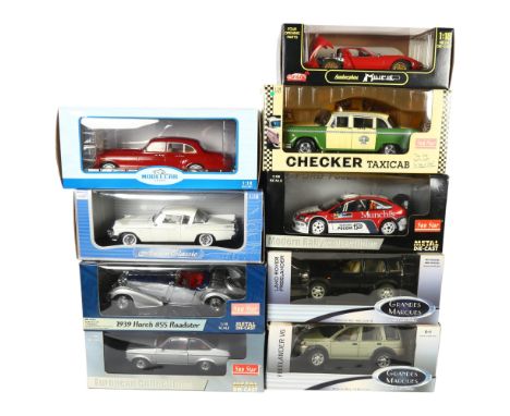 A quantity of 1:18 scale diecast models, in original boxes, some with associated display stands, including such brands as Sun