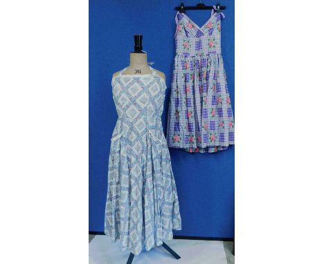 Two c.1950's / 60's lady's printed cotton summer dresses, one halter neck with front patch pockets, the other in floral gingh