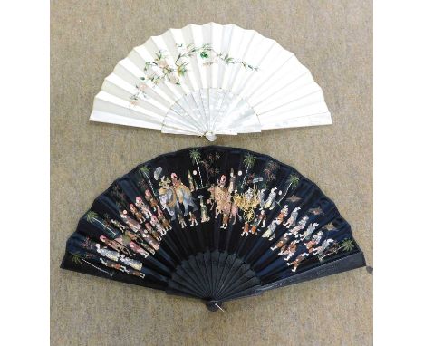Two fans: to include a mother-of-pearl handled and floral silk embroidered fan and an Eastern ebonised hardwood carved and do