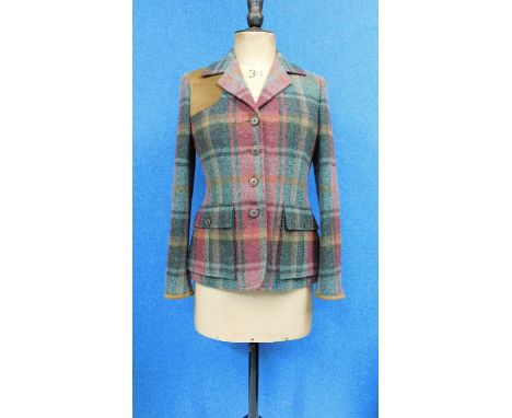 A lady's Ralph Lauren twee jacket in greens and red, with brown satin lining, single breasted four button with front patch po