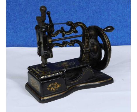 ***PLEASE NOTE AMENDMENT* A late 19th century sewing machine, 'The Globe', P.3115, approx. 36cm wideOriginally listed as C.18