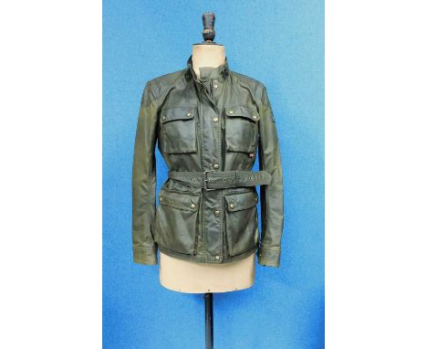 A lady's Roadmaster Belstaff jacket, the green jacket with zip front, storm placket with poppers, front flap breast pockets a